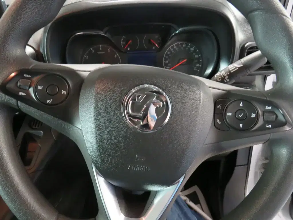 White Vauxhall Combo.