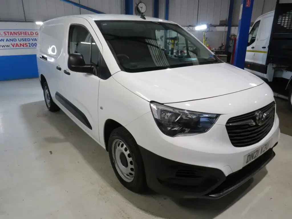White Vauxhall Combo.