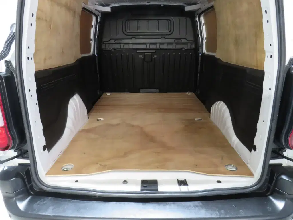 White Vauxhall Combo.