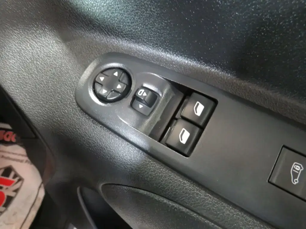 White Vauxhall Combo.