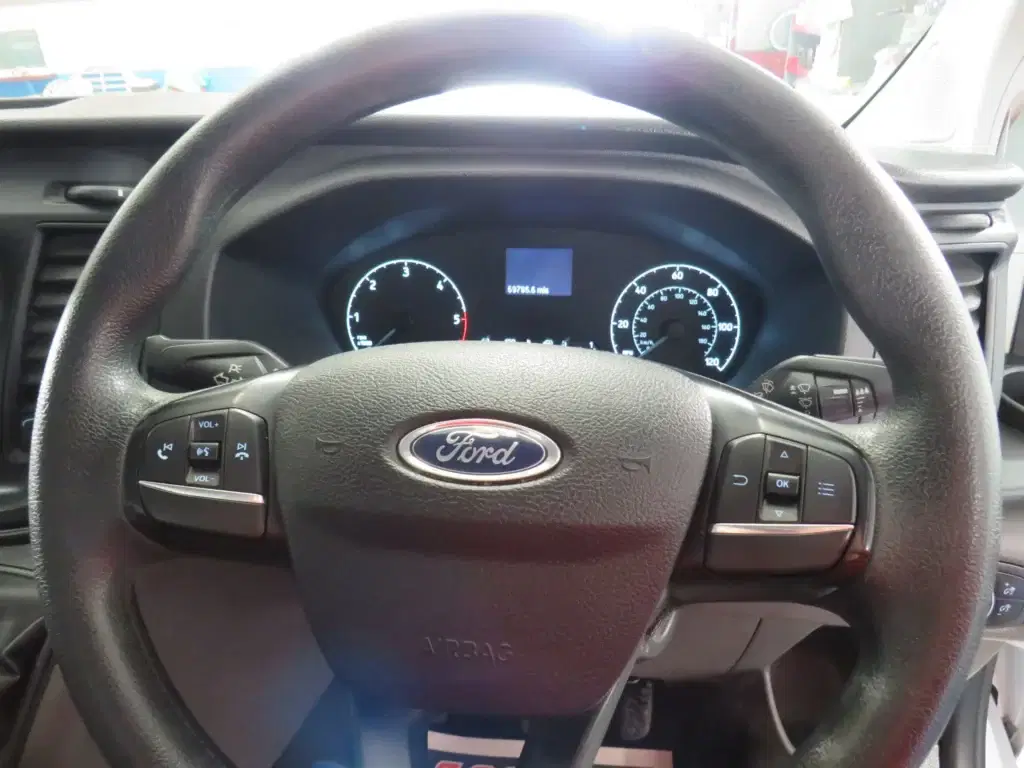 White Ford Transit Custom.