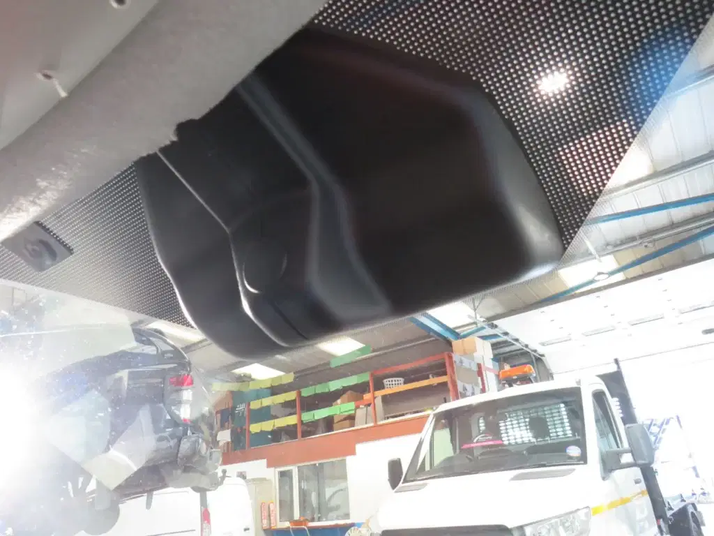 White Ford Transit Courier.