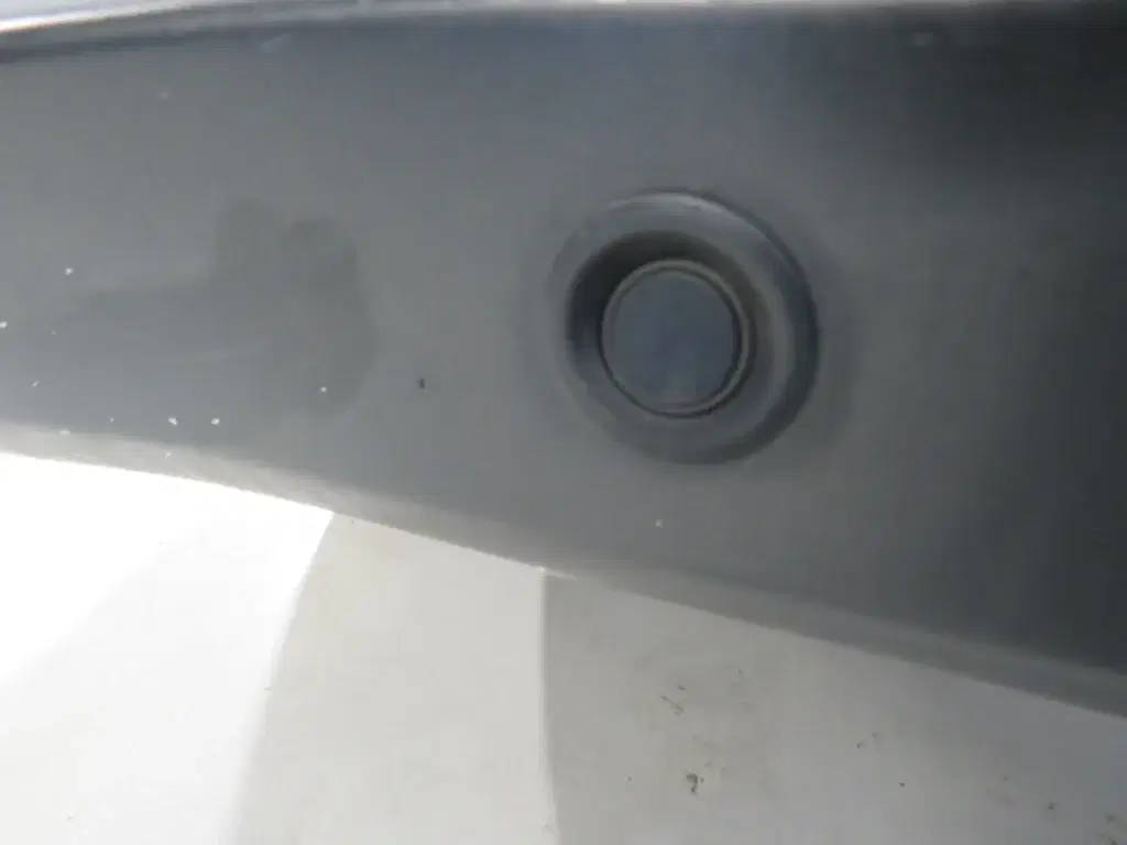 White Ford Transit Courier.