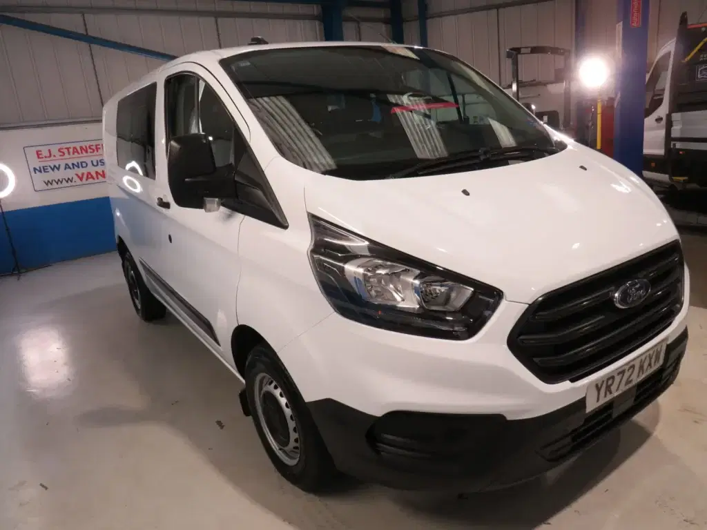 White Ford Transit Custom.