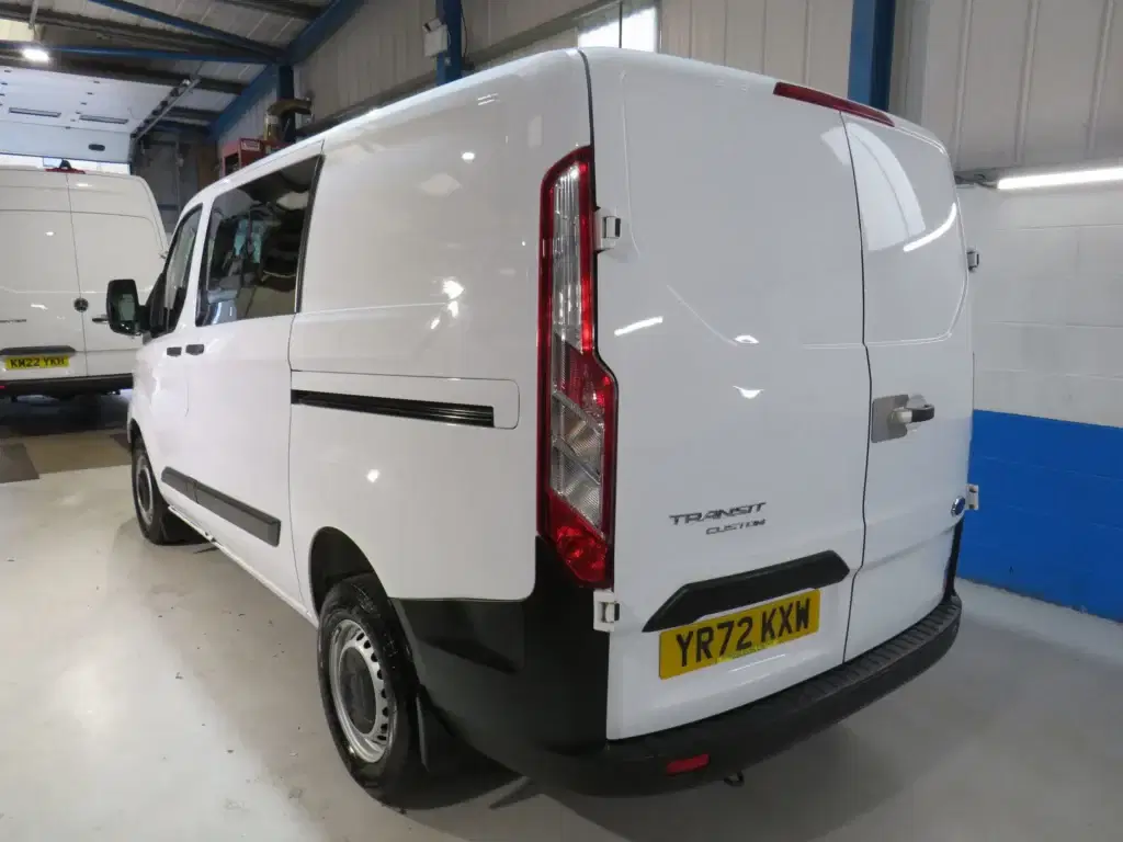 White Ford Transit Custom.