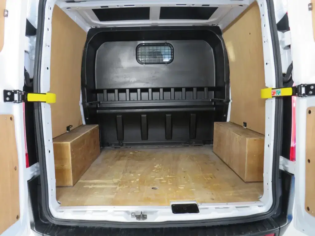 White Ford Transit Custom.