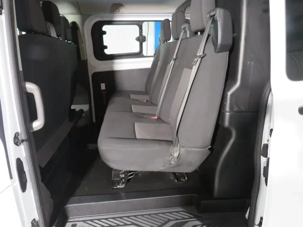 White Ford Transit Custom.