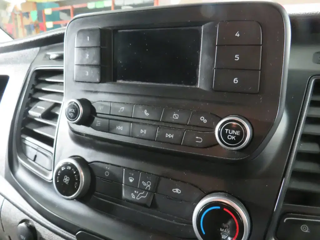 White Ford Transit Custom.