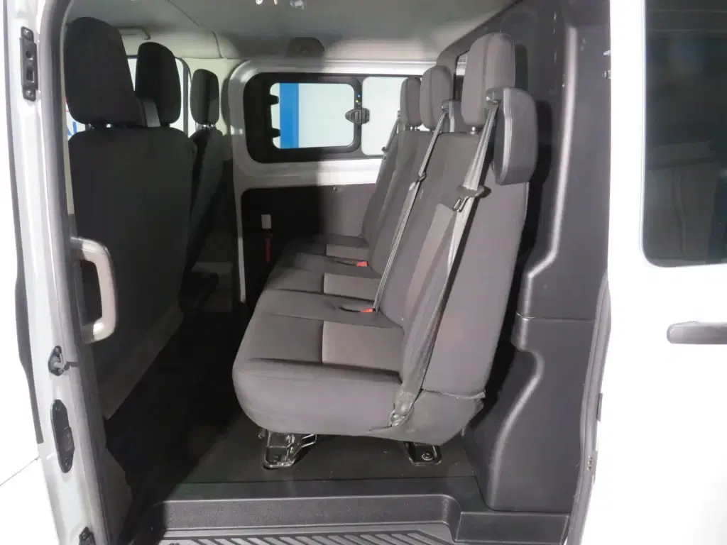 White Ford Transit Custom.