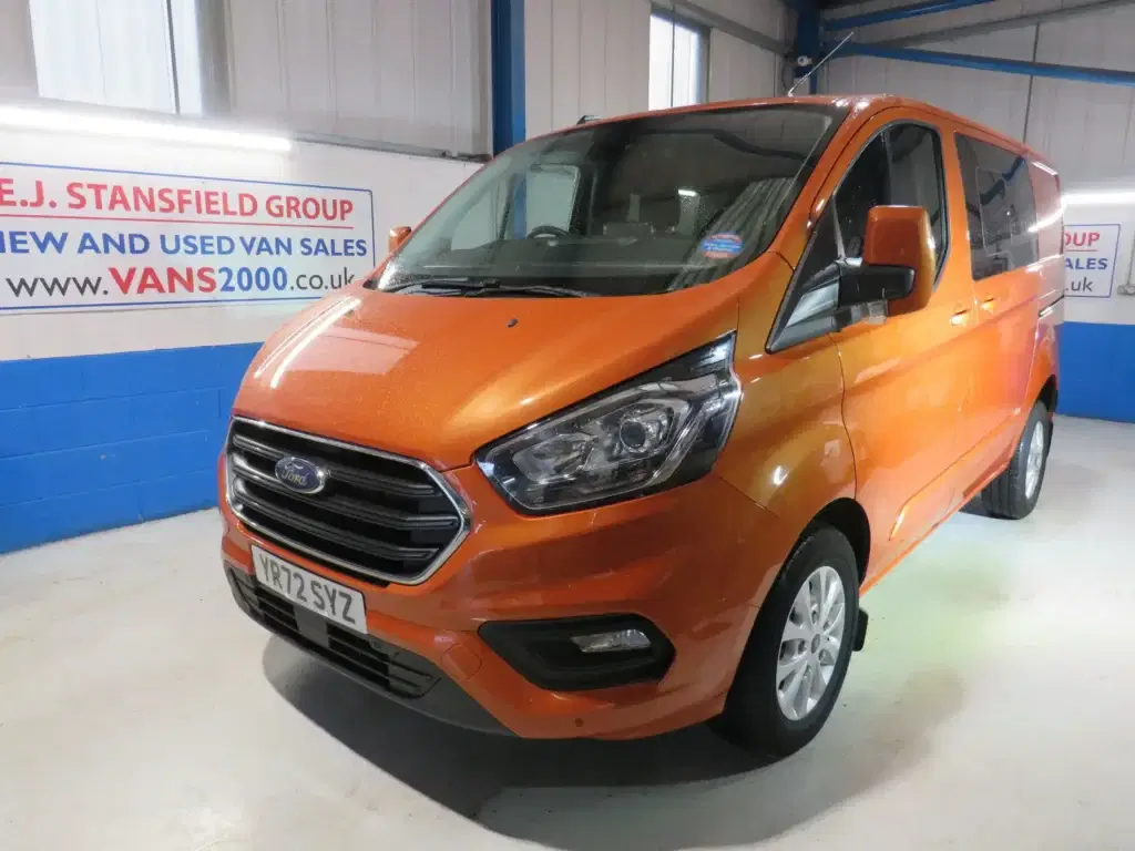 Orange golden Ford Transit Custom.