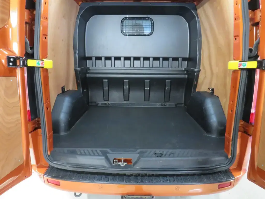 Orange golden Ford Transit Custom.